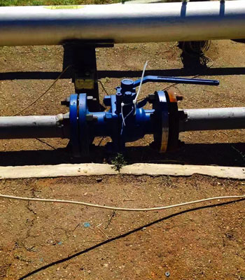 blue color check valve installed in the outdoor of our clients industrial unit to control the flow of direction by Oilway