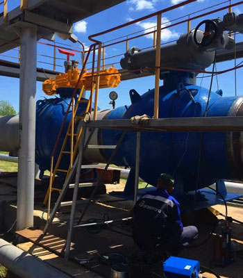 Blue and grey colored Globe valve installed in industrial unit outdoor by Oilway Singapore's top globe valve manufacturer & supplier