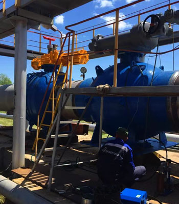 blue with silver colour gate valve installed in the outdoor of our clients industrial unit to control the flow of direction